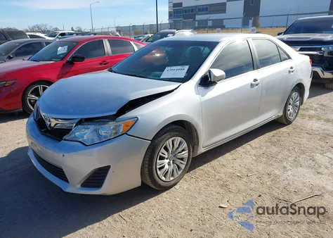 2014 Toyota Camry Le z USA, uszkodzony, nr VIN 4T4BF1FK8ER420967